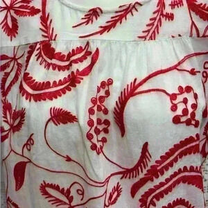 Market Spruce white shirt with red embroidered design longer back shirt . Size M